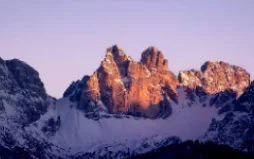 A copied photo of the Dolomites at dusk